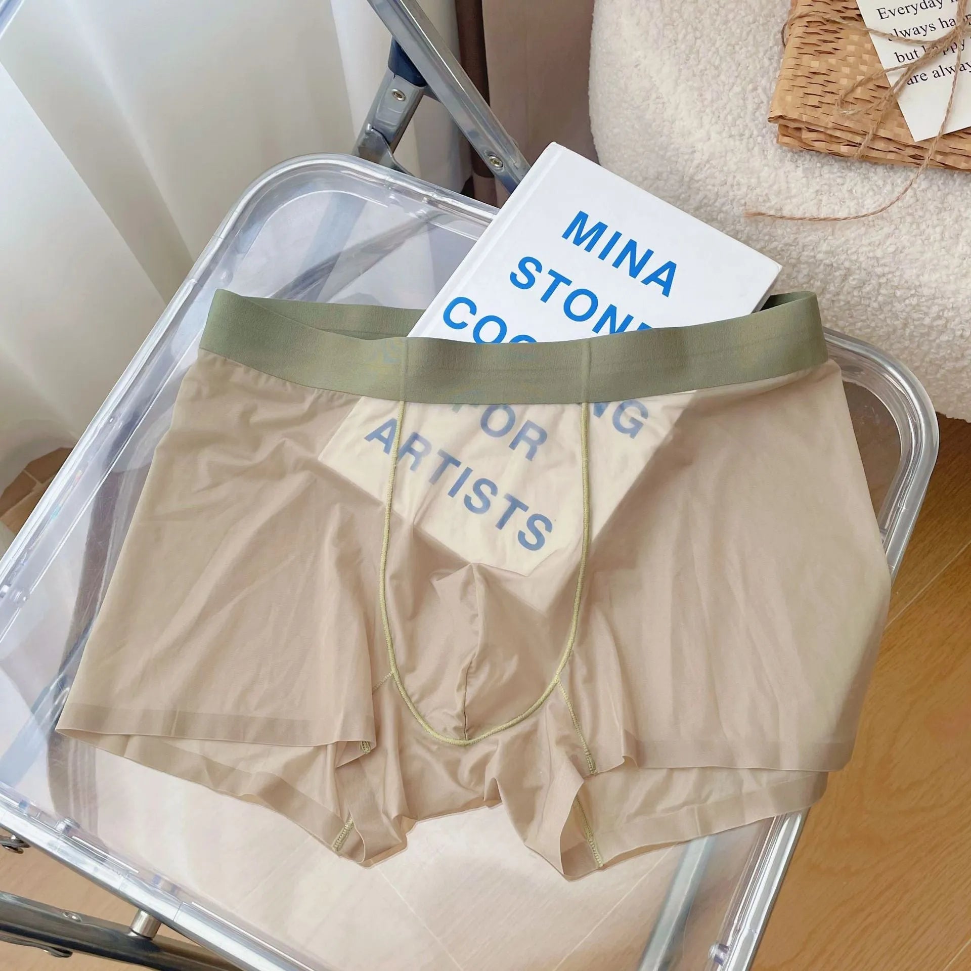 Thin breathable men's boxer shorts in seamless quick-drying nylon fabric showing mid waist design