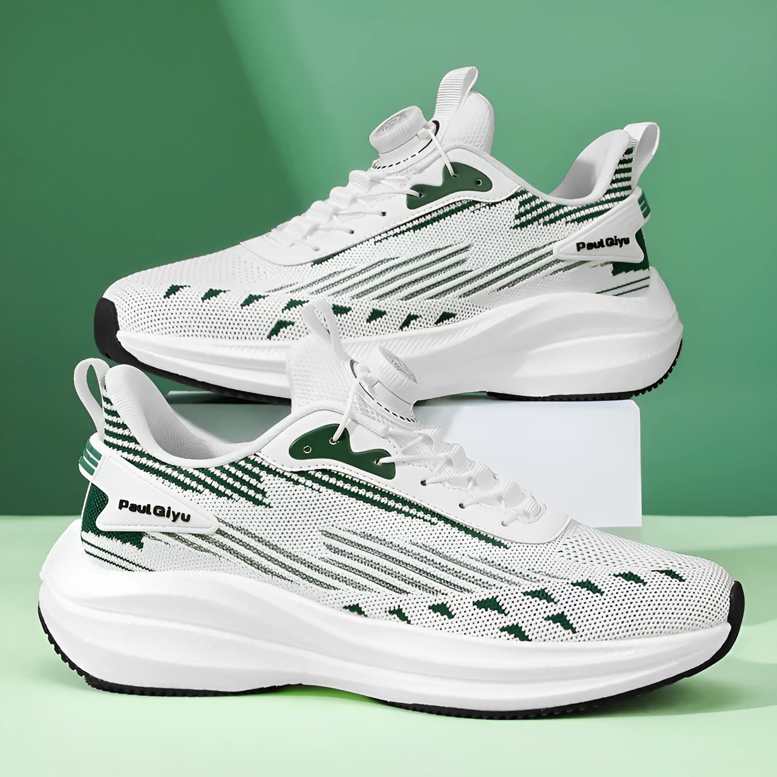 Men's white and green low-top sports shoe with rotating buckle and mesh upper on a flat TPU sole.
