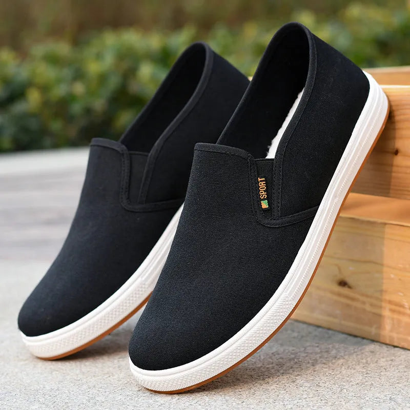 Men's black and blue canvas slip-on shoes with round toe and shallow cutting depth