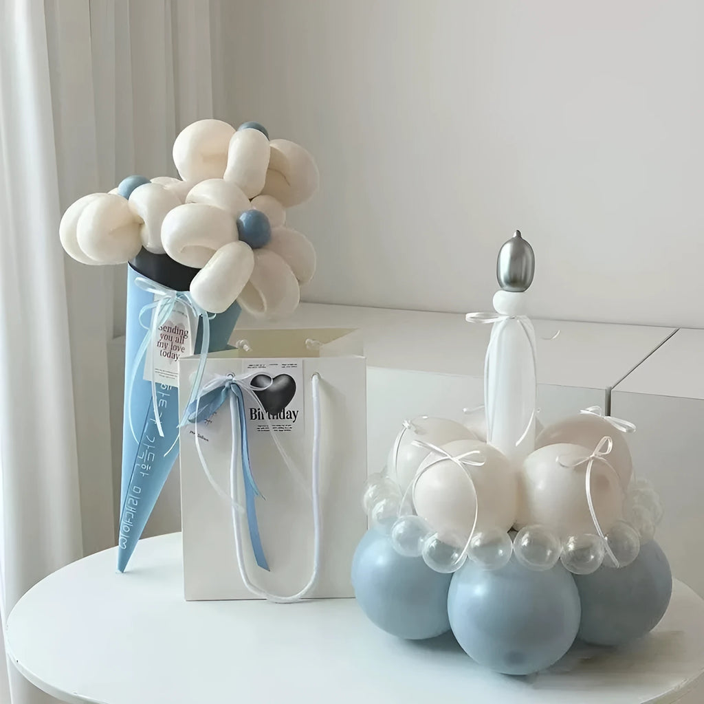Finished round balloon bouquet decoration for cake table centrepiece.