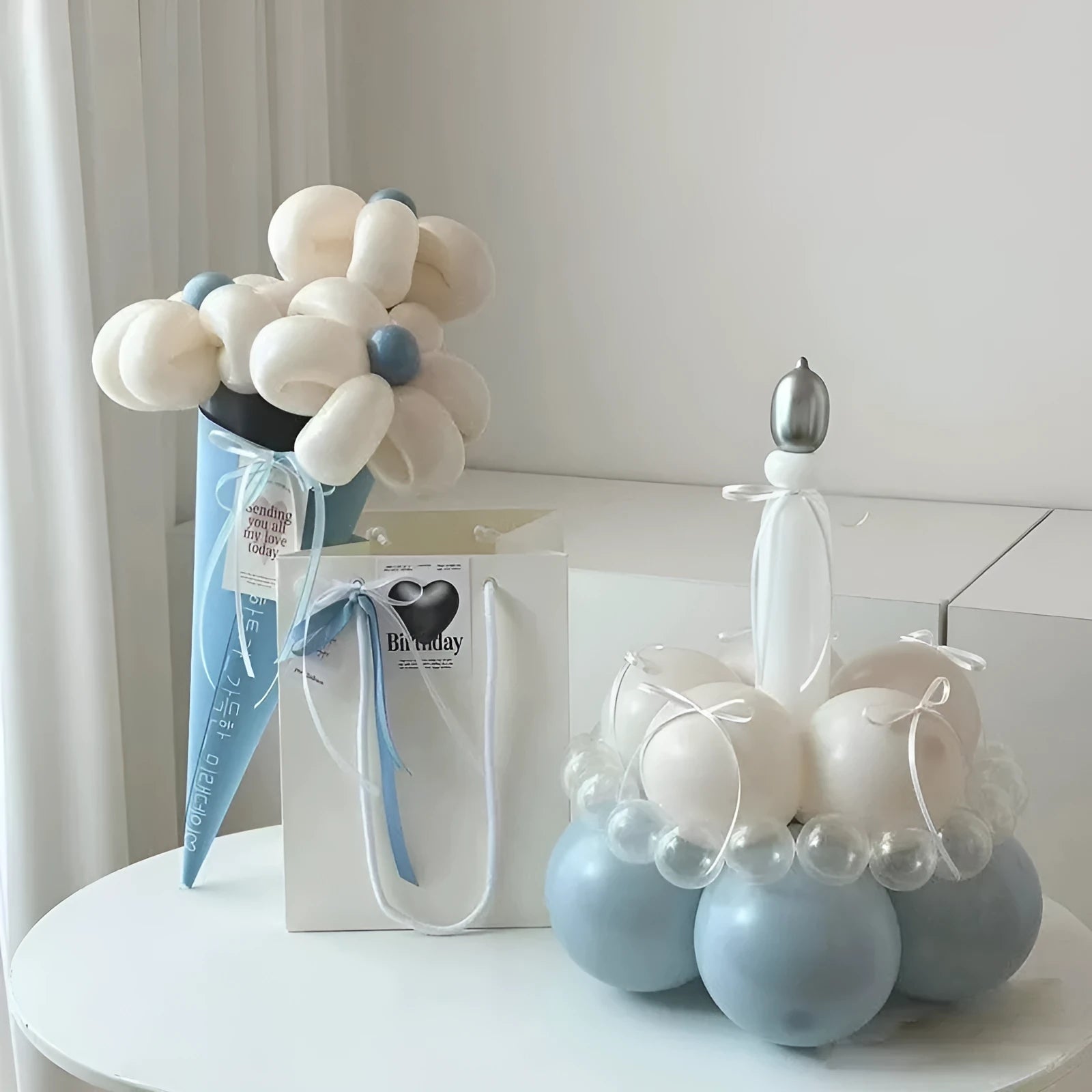 Finished round balloon bouquet decoration for cake table centrepiece.