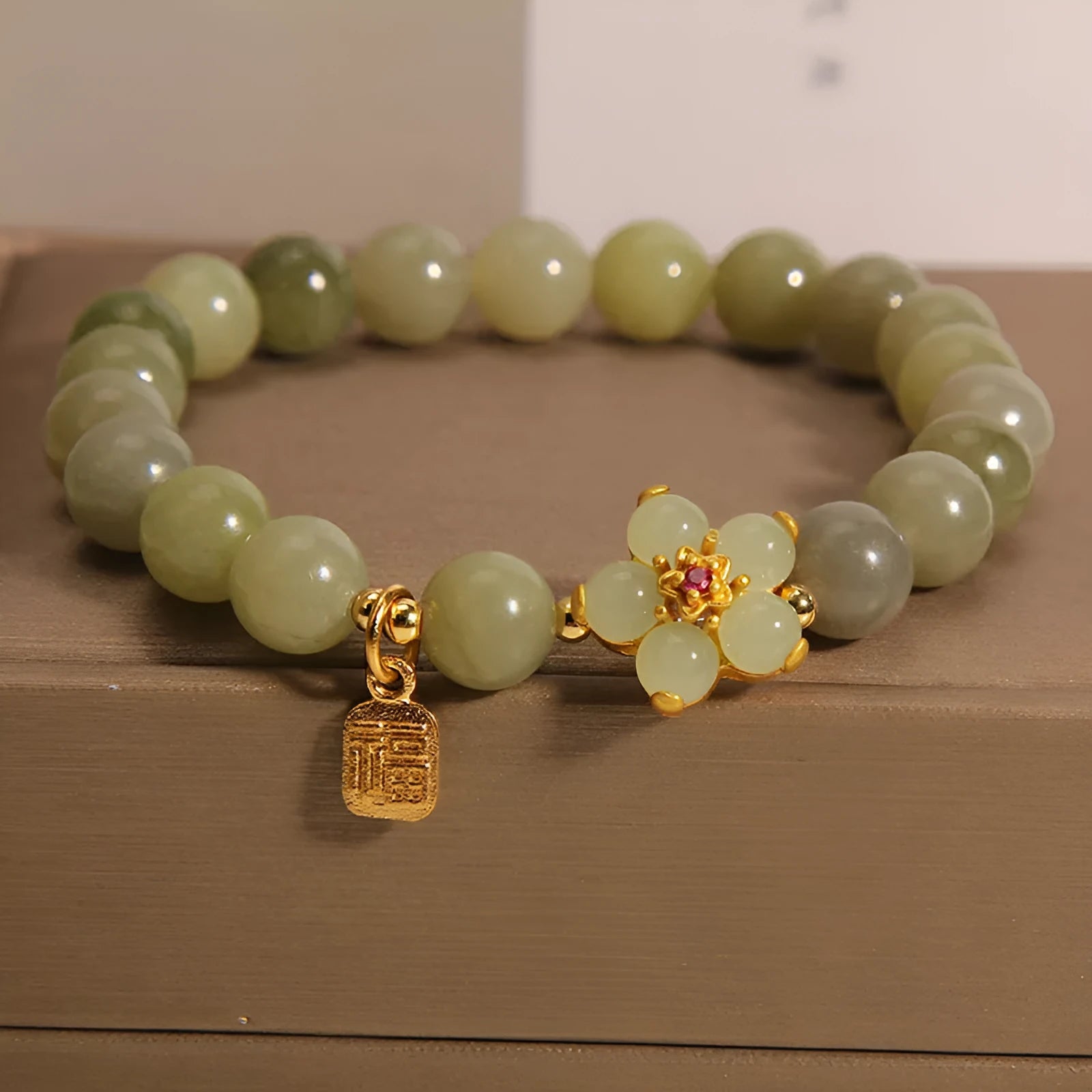 Women's casual bracelet with gray jade decoration and alloy construction