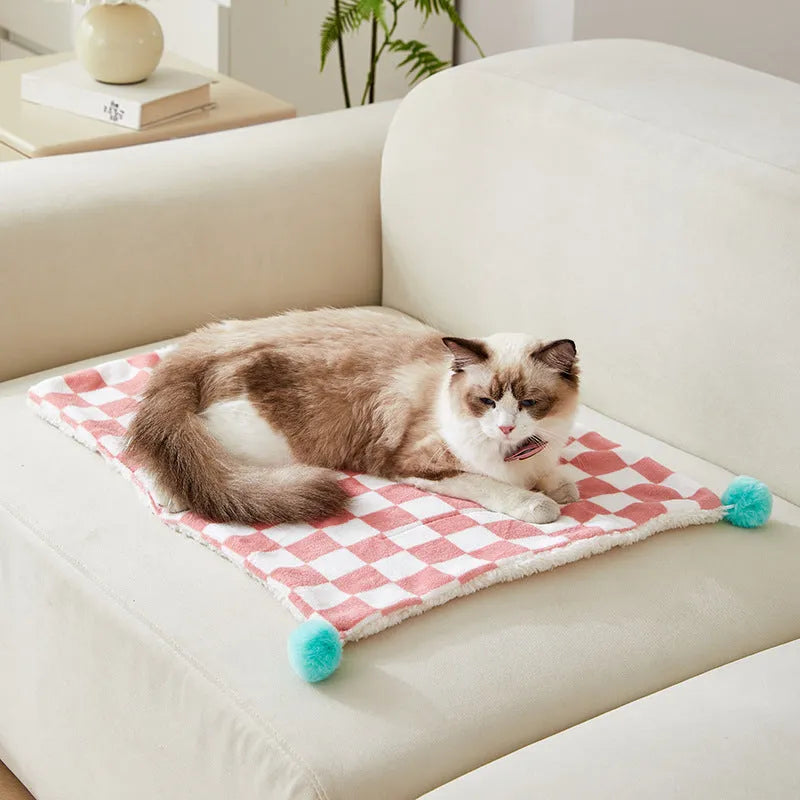 Plaid pattern pet blanket with fur ball decorations in green, pink or yellow colours