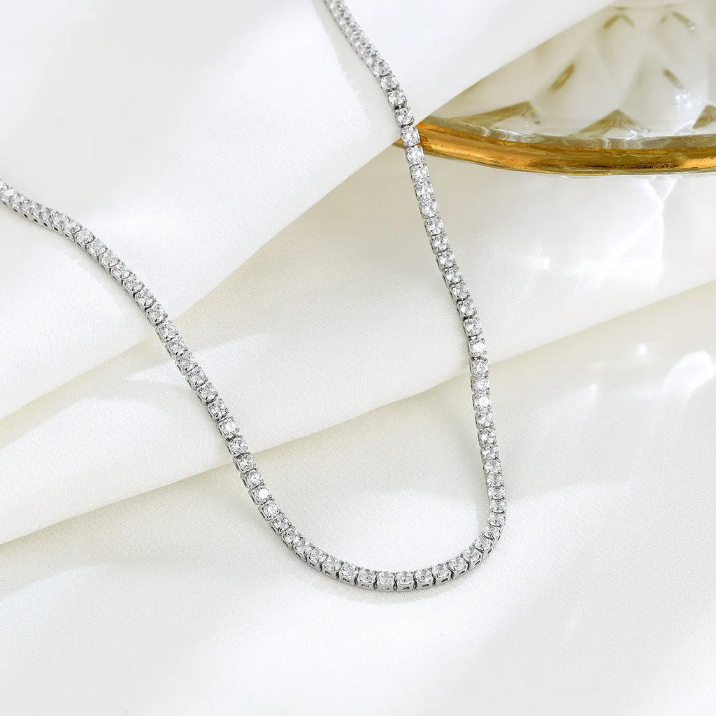 Women's sterling silver necklace with round elements and diamond treatment