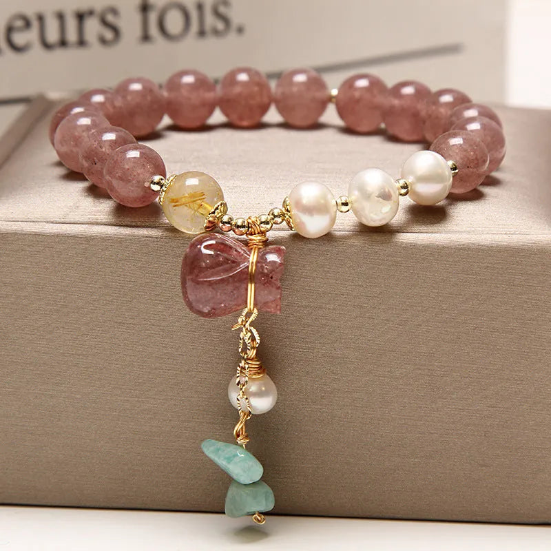 Women's multi-layer crystal bracelet with natural garnet, strawberry quartz, and moonstone pendants in Korean style.