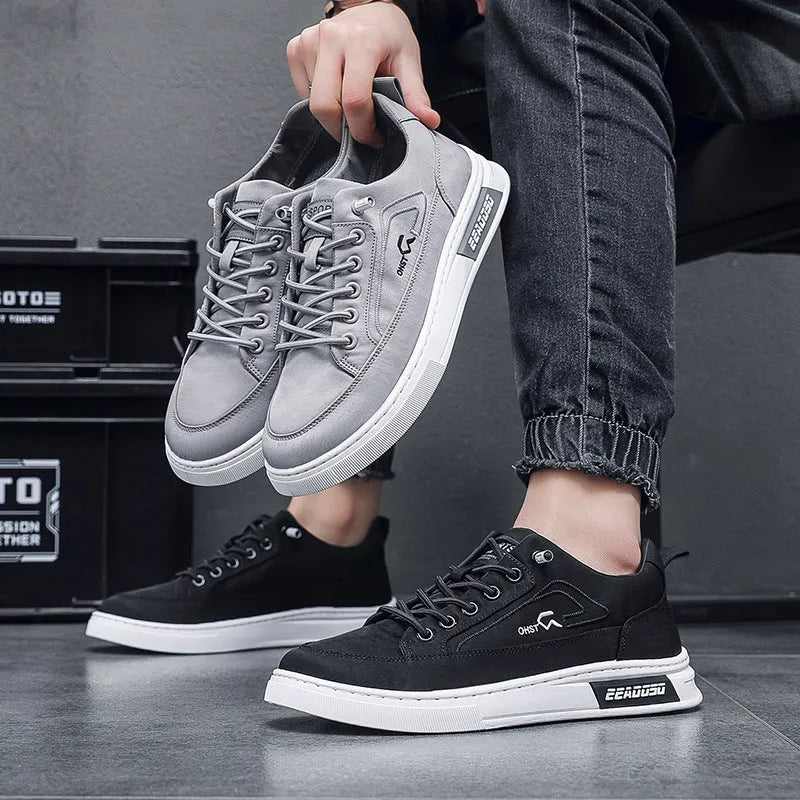 Men's grey canvas casual sneakers with leather lining and round toe design