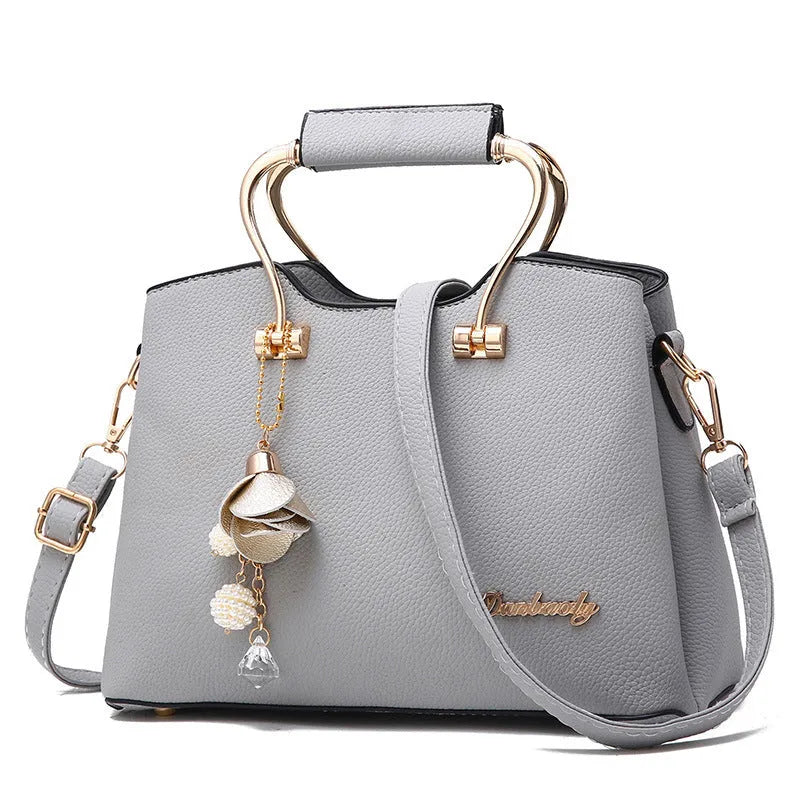 Large capacity PU leather women's handbag in horizontal square shape with sewing line detail, available in seven colours