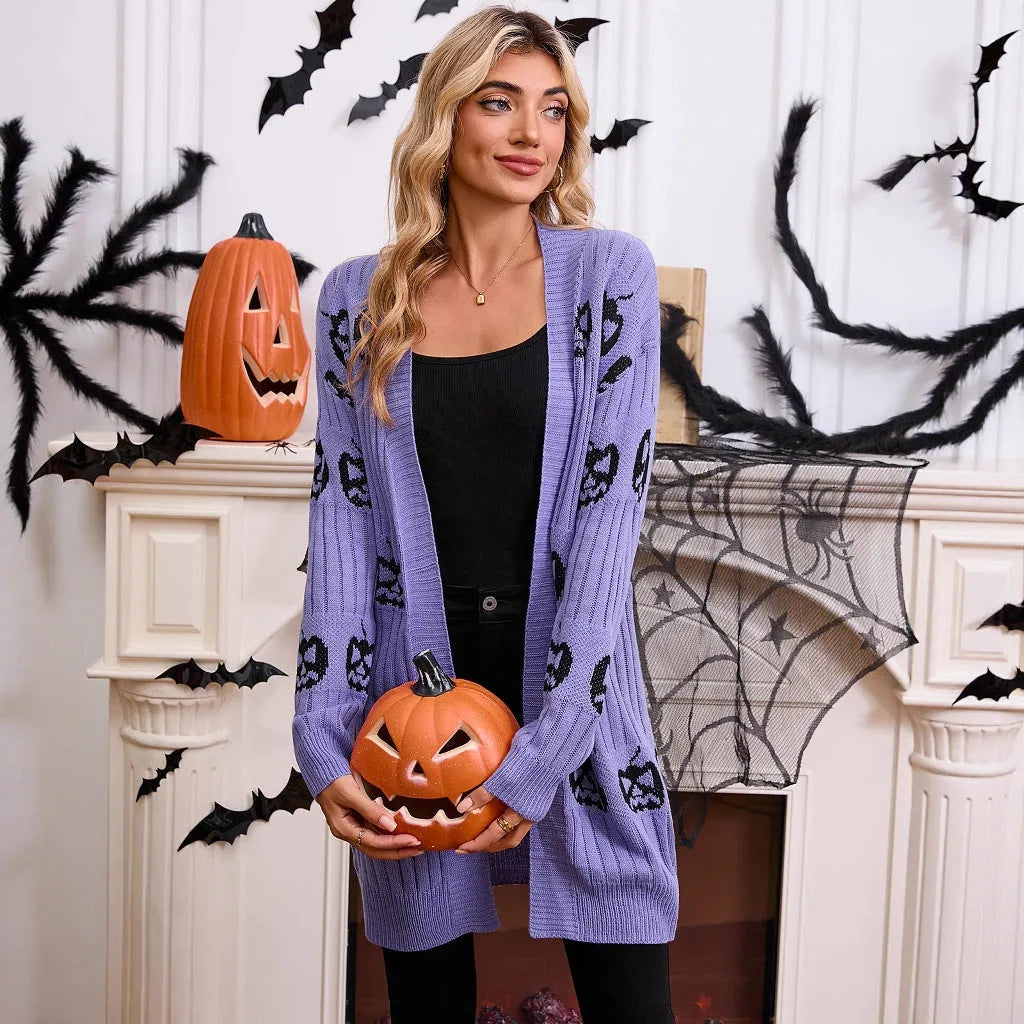 Women's black Halloween cardigan with orange Jacquard pumpkin head pattern on the front.