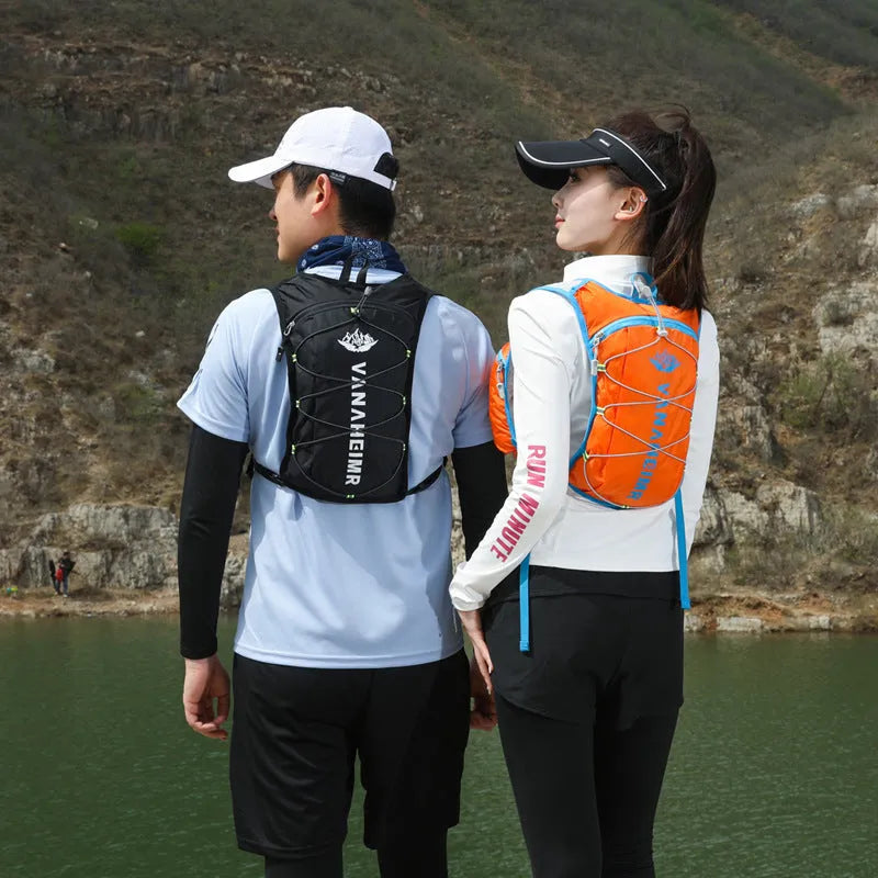 Ultra-light outdoor backpack in streamer orange colour with air pillow belt system for cycling and sports
