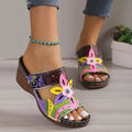 Colourful ethnic pattern women's slip-on sandals with cowhide upper and rubber sole in multiple colour options.