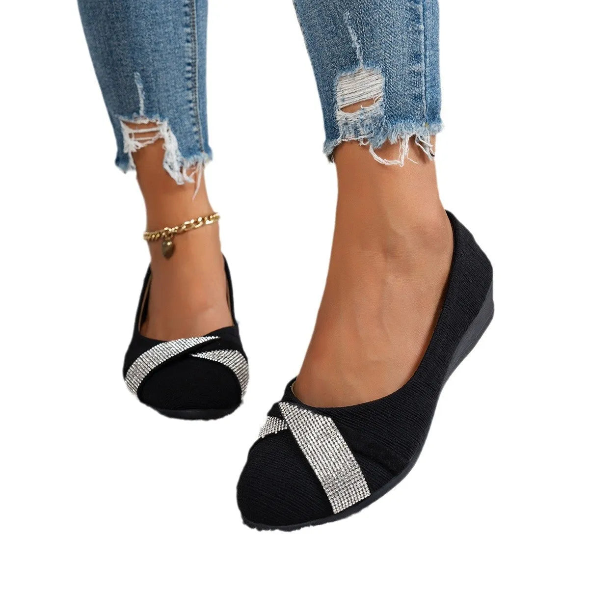 Black women's slip-on casual shoes with a chunky heel and rhinestone decoration on the fabric upper.