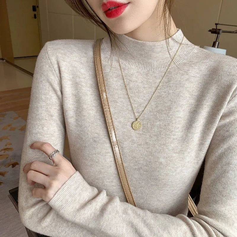 Slim fit long sleeve knitted top in viscose fibre available in multiple colours with Western style design