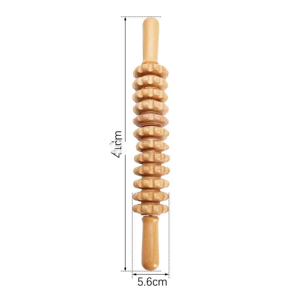 Assorted beech wood massage rollers including T-shaped and multi-wheel sets on a plain surface.