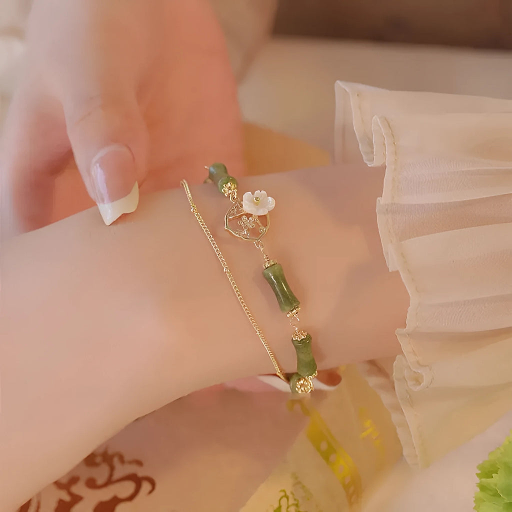 Natural olivine bracelet with double layer twin bells of Ireland design and olive branch elements