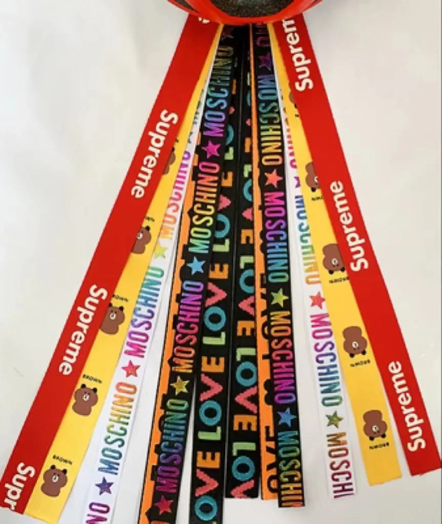 A colourful helmet streamer accessory for children's sports helmets and doll decoration.
