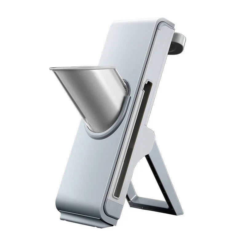 Hand-crank vegetable cutter in simple grey with three blades and fresh-keeping box on a kitchen counter