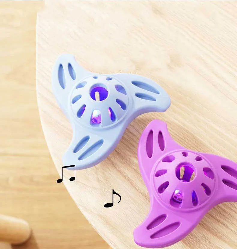Blue boomerang-shaped rubber chew toy for medium and large dogs on a plain background.