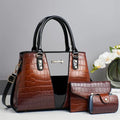 Women's crocodile stitch three-piece shoulder bag set in PU leather showing main bag and two smaller bags