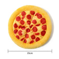 Yellow pizza slice shaped soft fabric dog chew toy with internal squeaker.