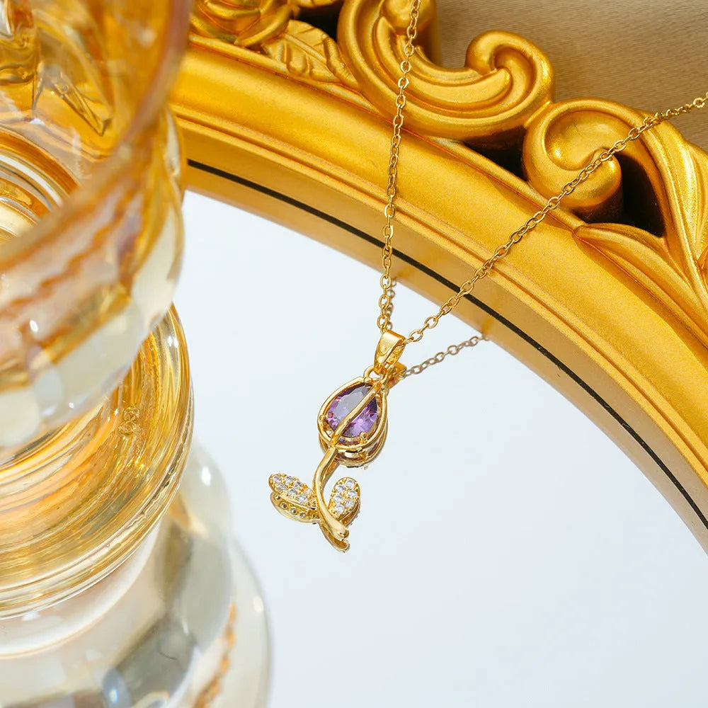 Gold-coloured tulip flower pendant necklace on a titanium steel chain for women.