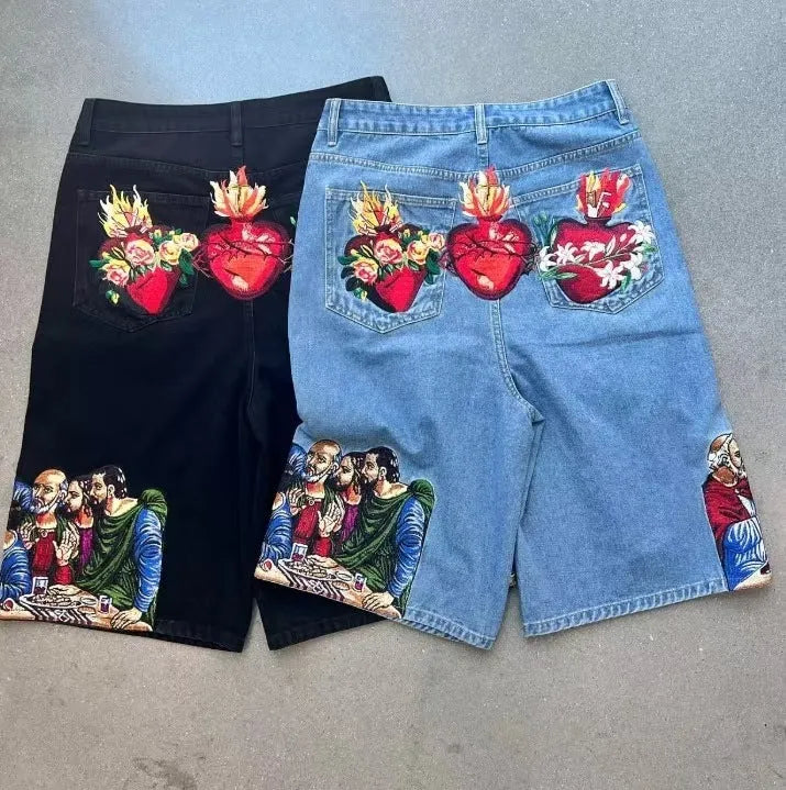 Men's blue cotton shorts with Jesus print on back pocket showing tapered leg fit