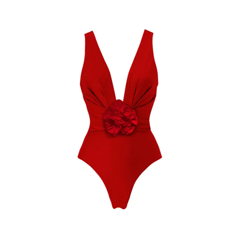 Red women's V-neck one-piece swimsuit with detachable skirt and open back design