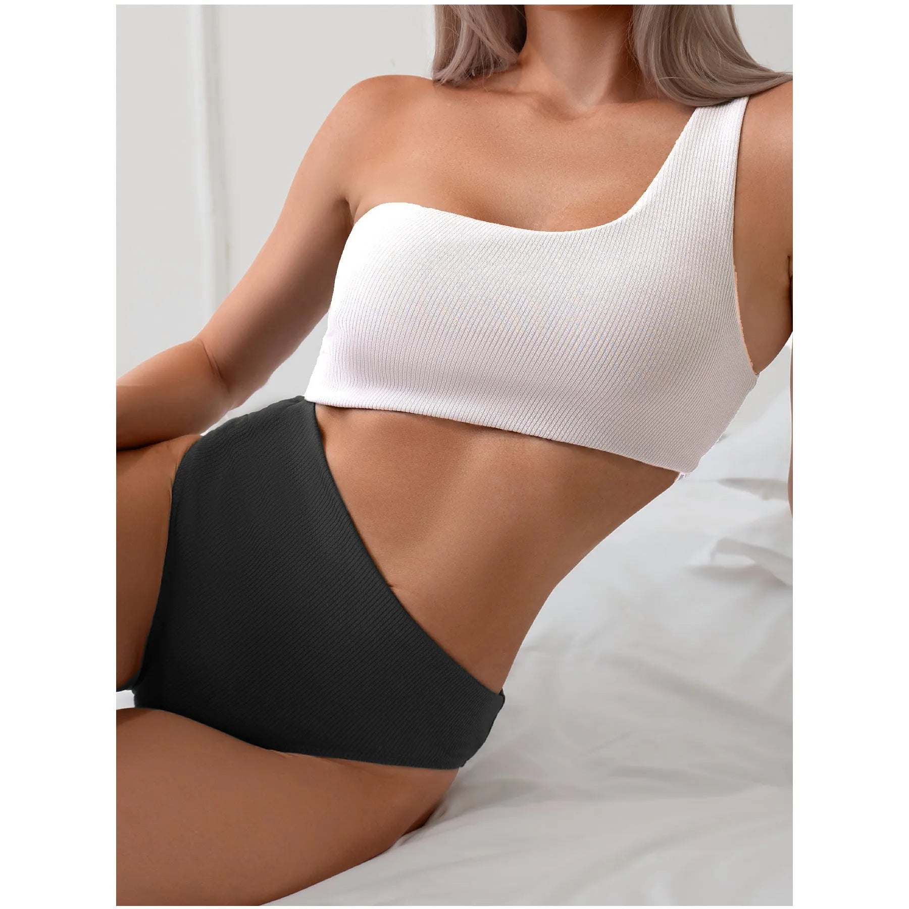 Women's light grey one-shoulder one-piece swimsuit made from polyester fabric