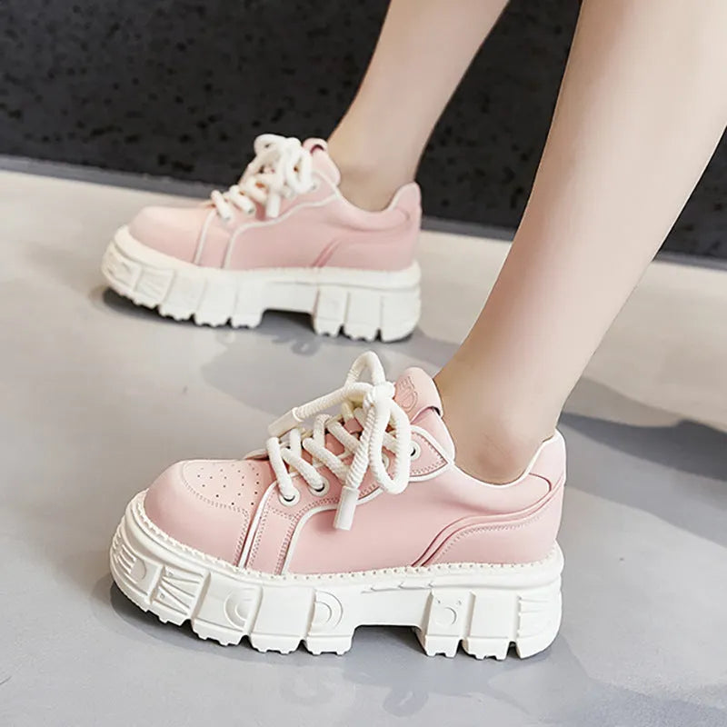 Women's beige leather muffin bottom casual slip-on shoes with a rubber foam sole.