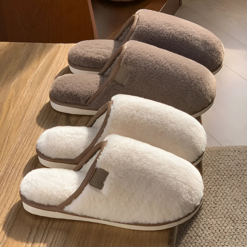 Winter plush slippers in solid colours with non-slip PVC soles and car stitching detail