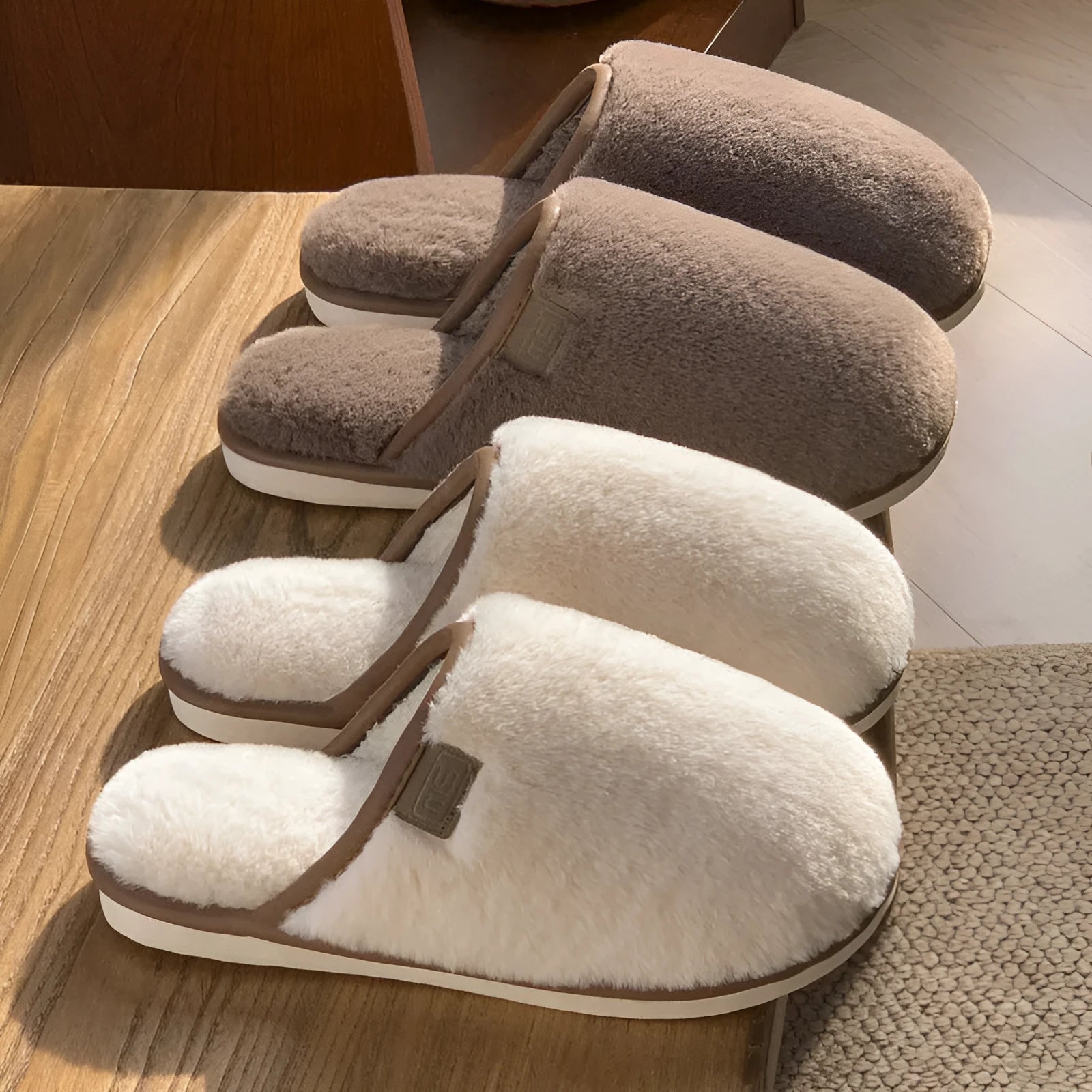 Winter plush slippers in solid colours with non-slip PVC soles and car stitching detail