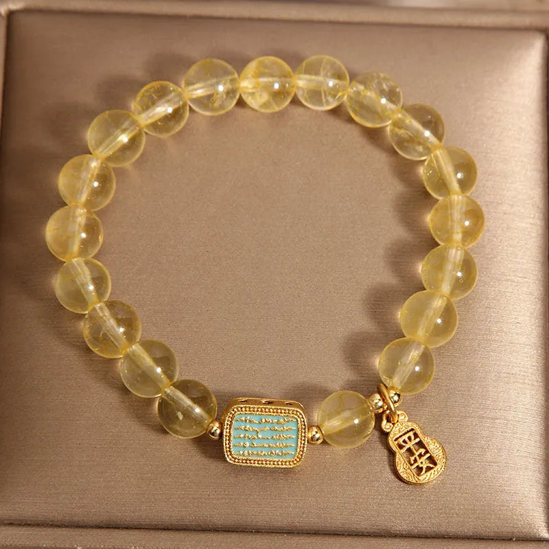 Women's yellow citrine crystal bracelet with rhinestones on adjustable 7-inch band