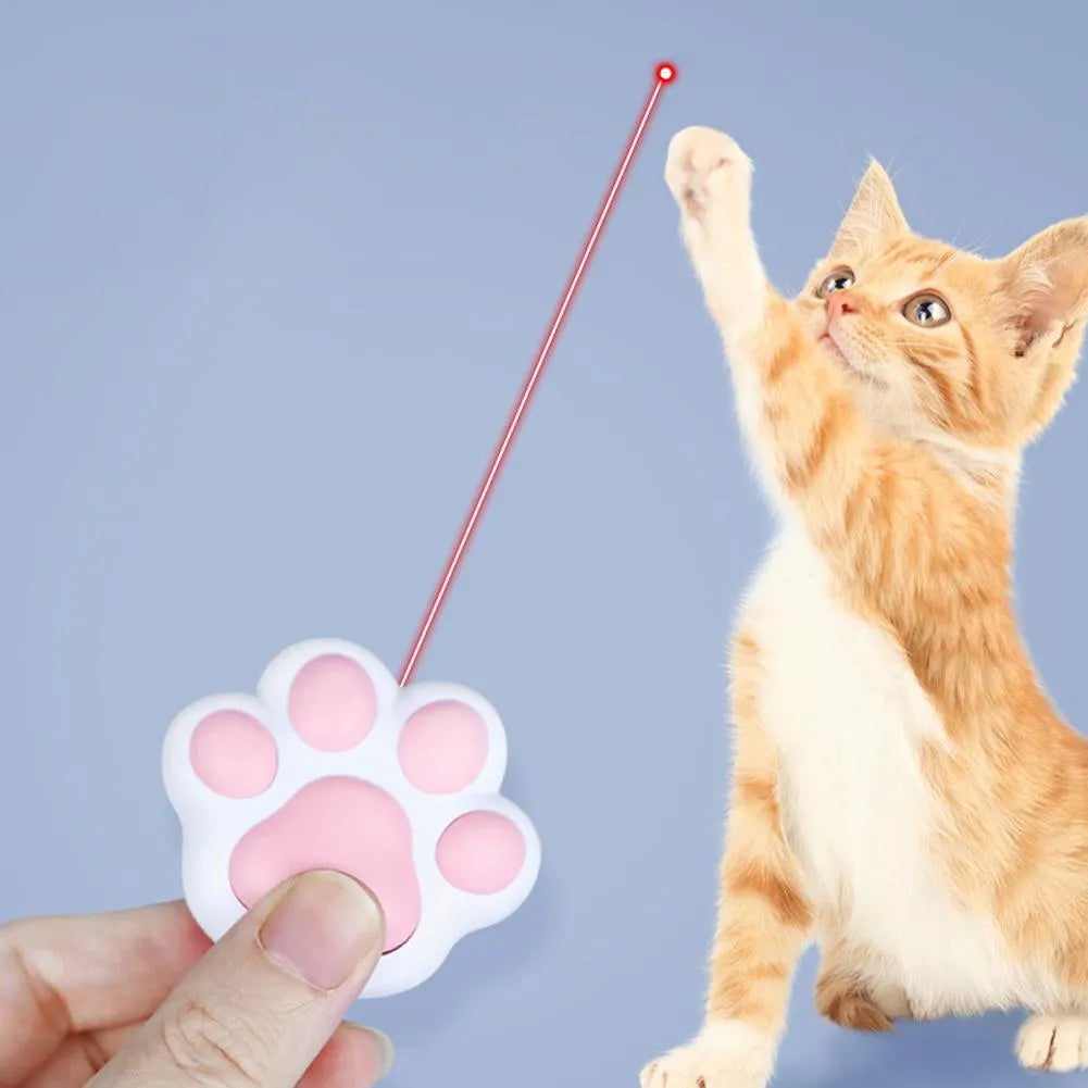Pink and black plastic USB rechargeable infrared cat teaser toy on a keyring