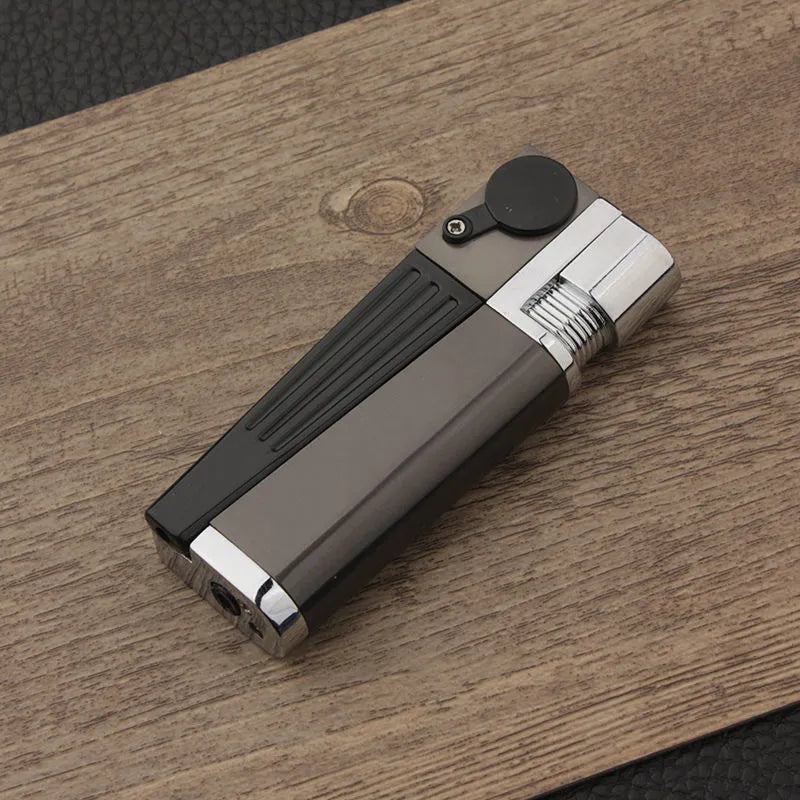 Silver foldable metal pipe lighter shown open, revealing the lighter mechanism and a small stash compartment.