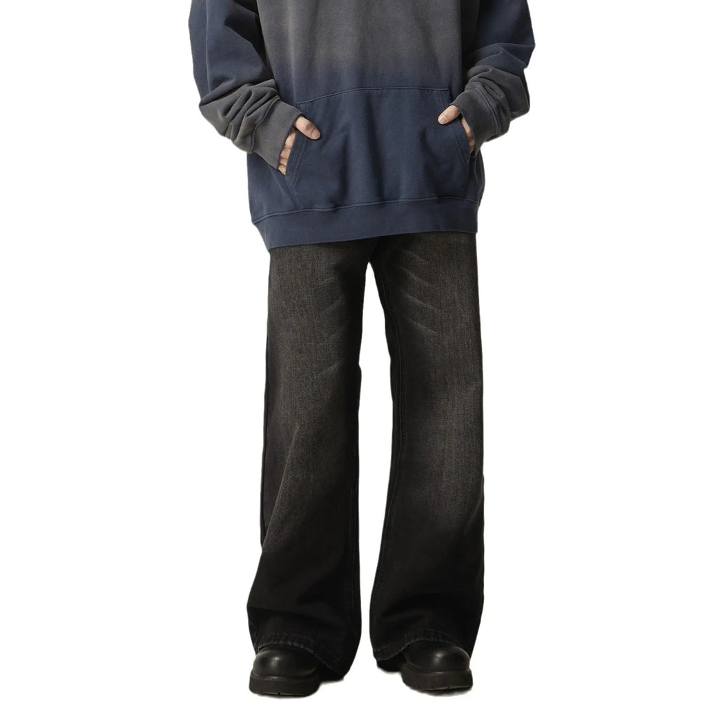 Black loose straight jeans with retro styling and zipper fly in polyester denim fabric