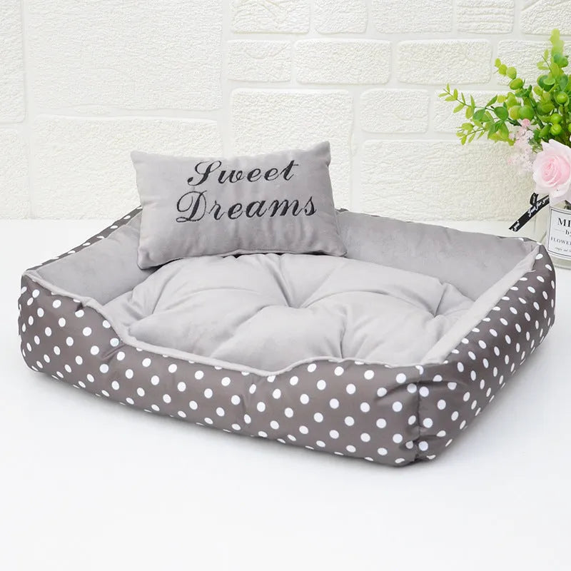 Polka dot printed square nest dog bed with removable embroidery pillow in grey, blue, pink, or red.