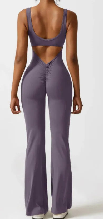 Women's tight seamless yoga bodysuit with hollow-out design and chest padding in black colour