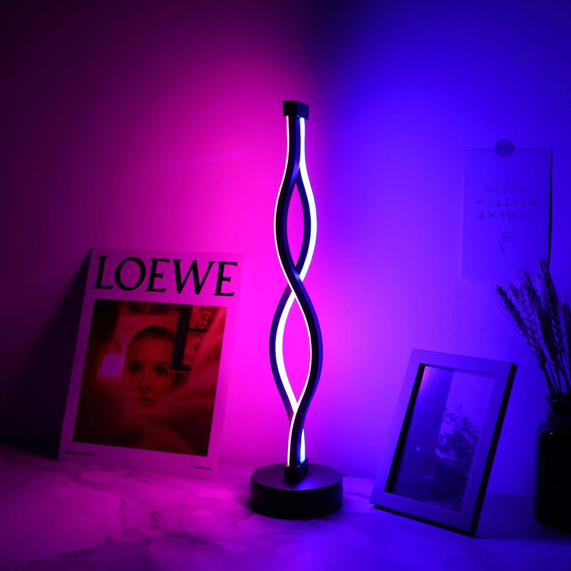 Black aluminium desk lamp with touch dimming controls and three-colour button