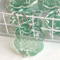 Acrylic four-leaf clover mobile phone pendant keychain in blue, green, and mint colours