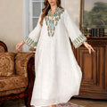 White polyester Arabic robe abaya dress with long sleeves and full-length skirt
