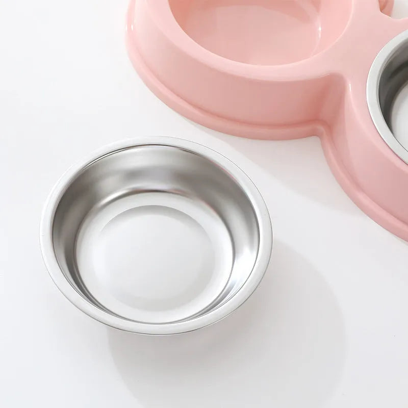 Stainless steel double pet bowl set with anti-slip frog base in blue, for cat or dog food and water.