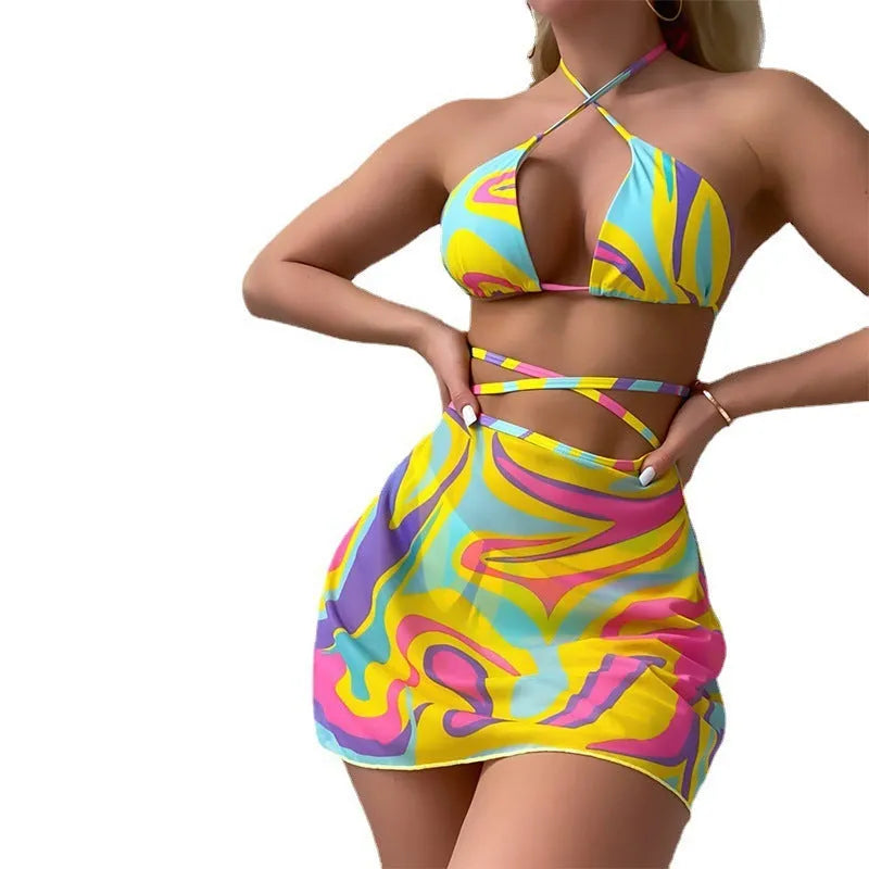 Yellow striped halter lace-up swimsuit set for women, showing top, skirt, and shorts.