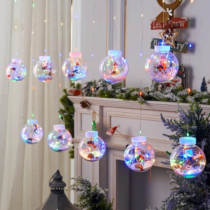 Christmas curtain light string with ten LED wishing ball lamps showing snowman, Christmas tree and elder designs
