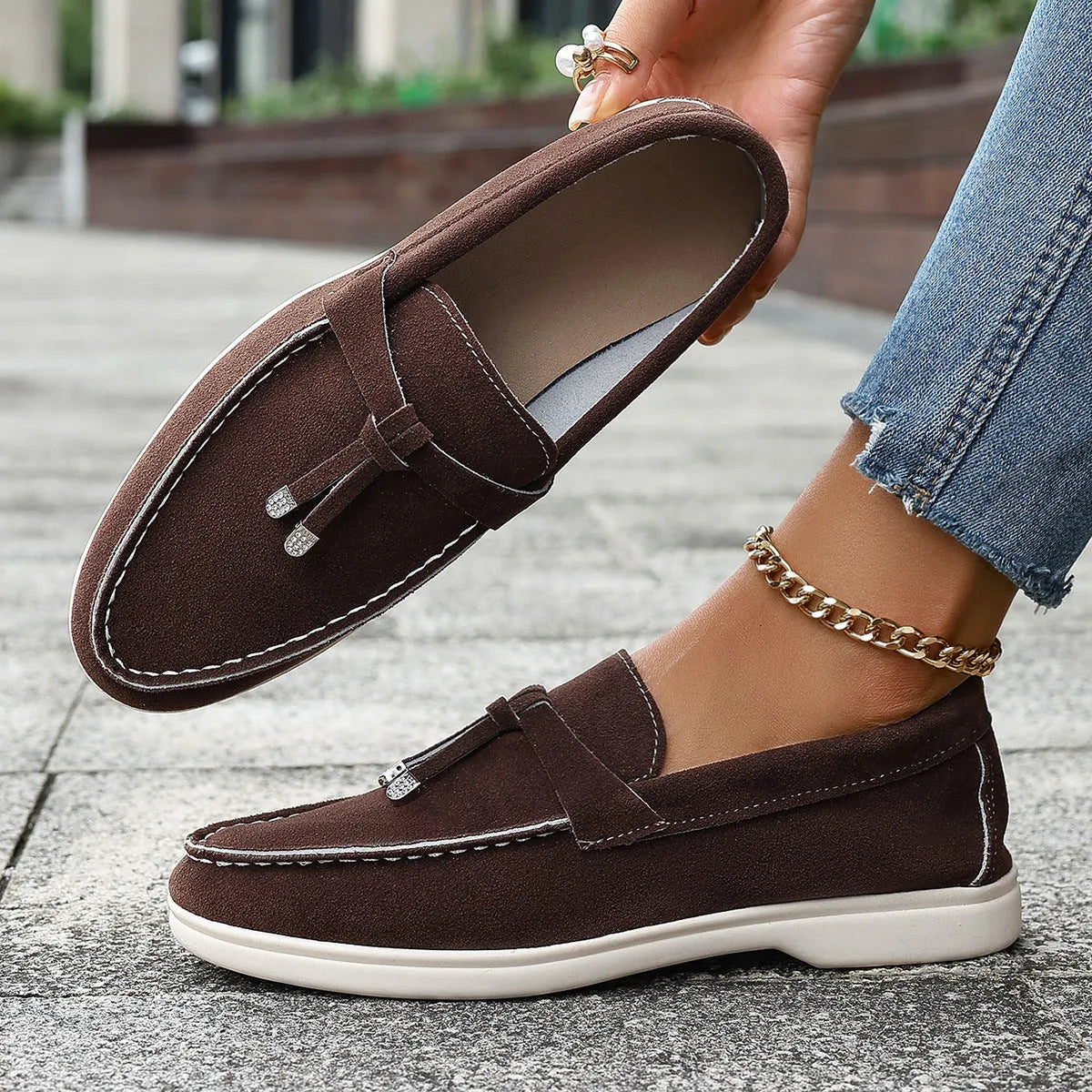Casual slip-on loafers with canvas upper, platform rubber sole, and round toe in black colour