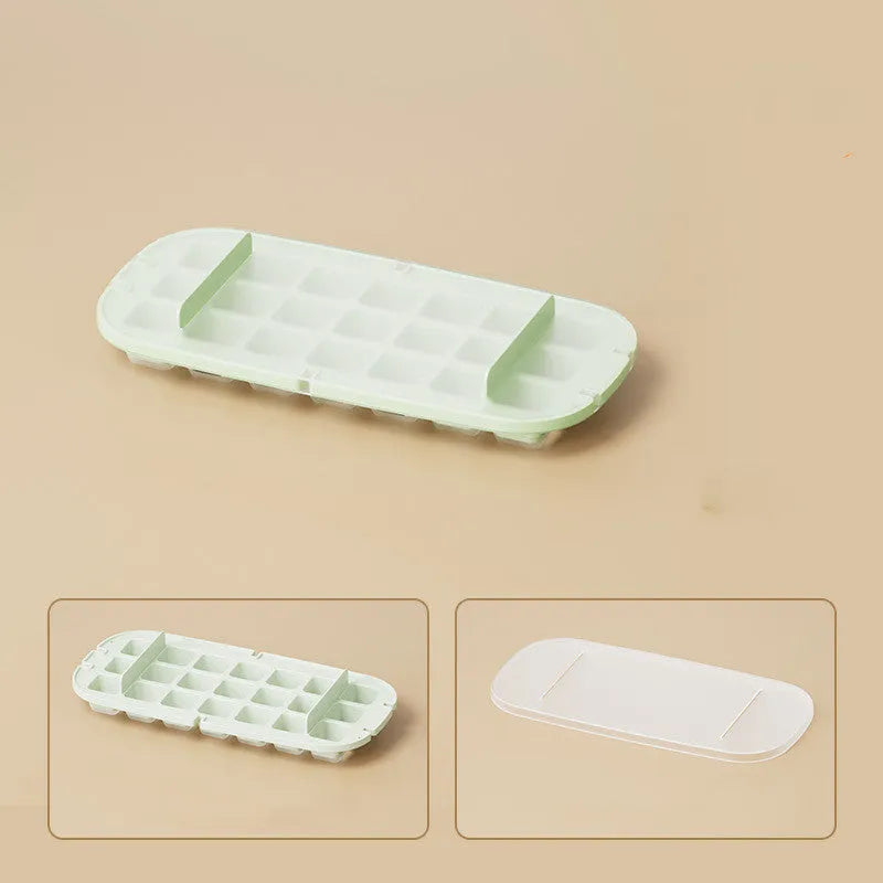 Yellow high-capacity ice cube tray with grid design and a storage slot for an ice shovel.