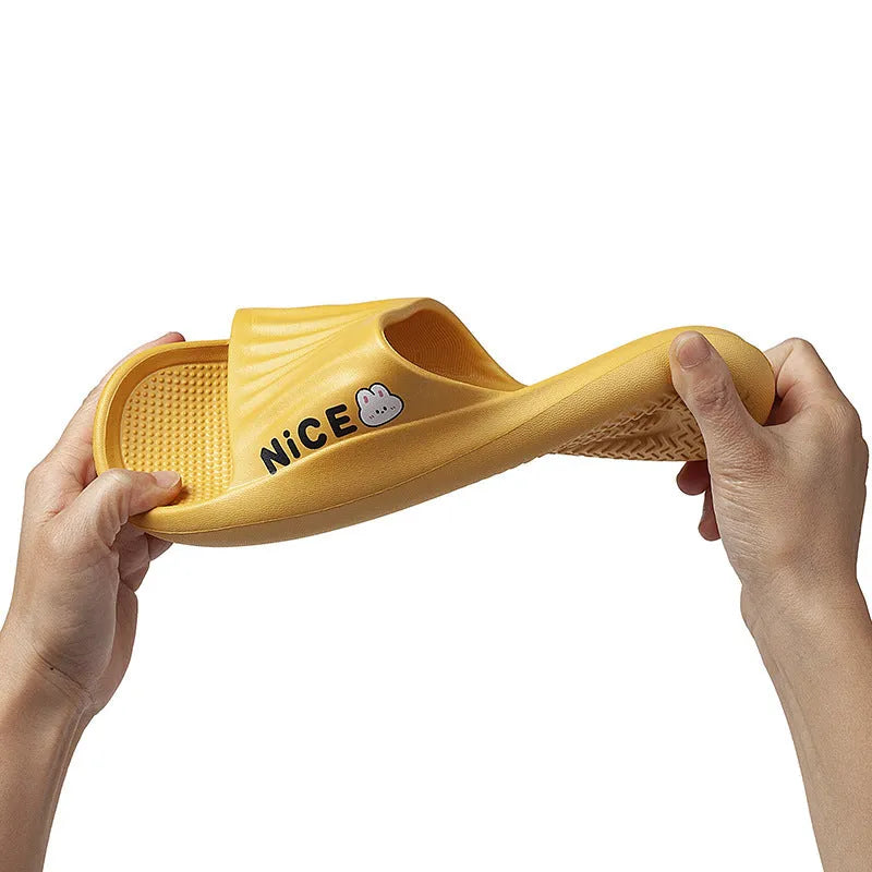 Adult unisex EVA bathroom slippers with cartoon pattern and non-slip sole in multiple colour options