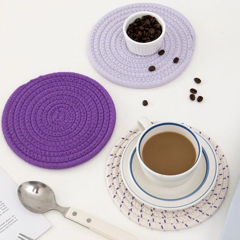 Cotton cord round coaster set showing three 18cm diameter placemats in modern colour options