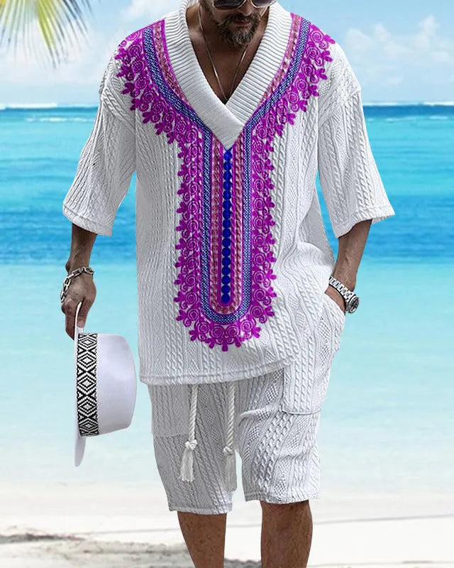 Printed men's knitted drop-shoulder short-sleeved top and matching shorts set in a polyester blend.