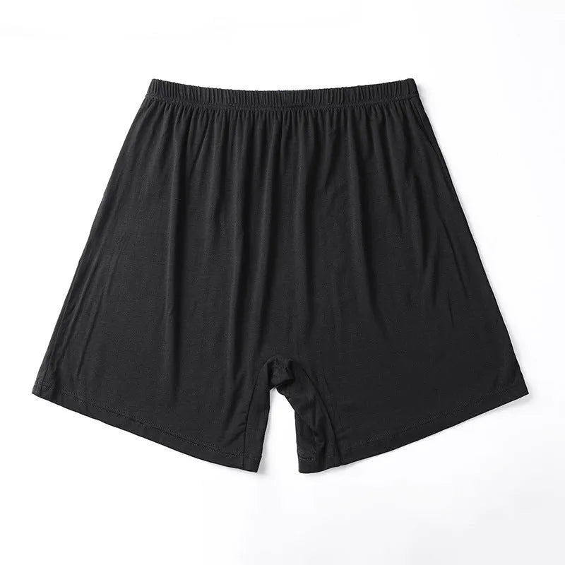 Mannequin wearing solid black high waist modal boxer shorts for men