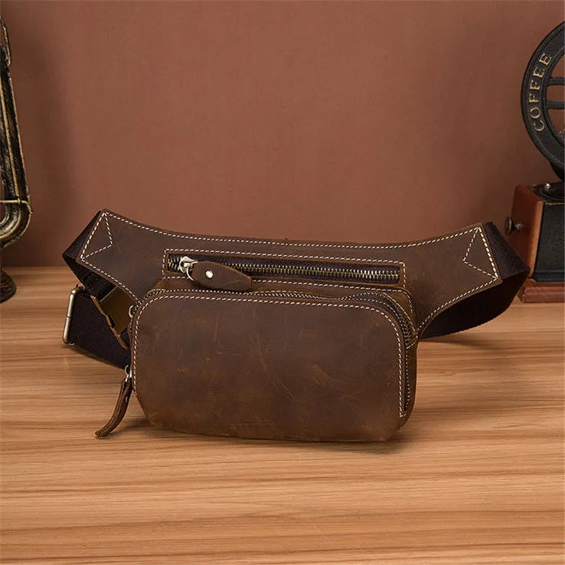 Brown cowhide leather men's sports waist bag with mobile phone compartment showing pull closure
