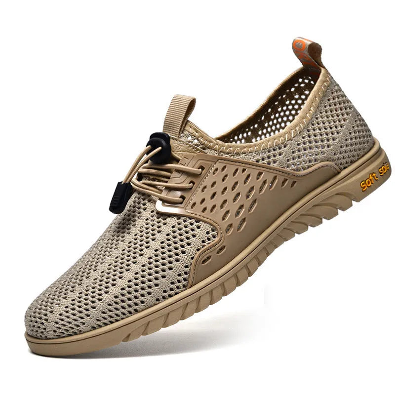 Men's breathable black mesh casual shoe with elastic band closure and rubber sole.